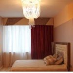 In the bedroom, beige and brown creates a sense of stability