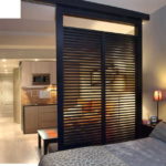 Option of a translucent partition for zoning the living room of the bedroom