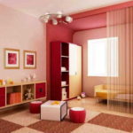 A different color of the walls is one of the zoning means. So the living room bedroom clearly has two parts that are different in purpose.