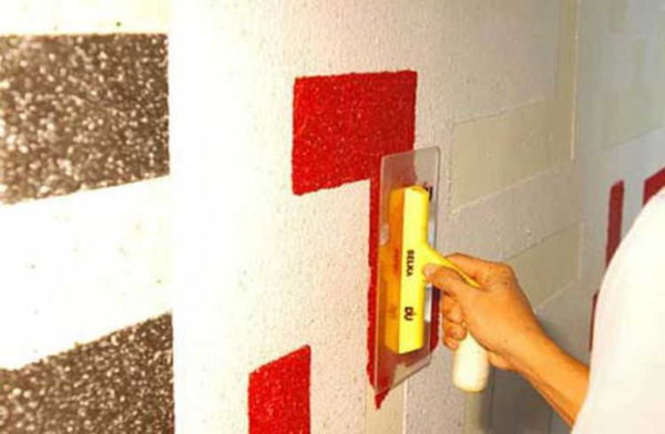 After removing the paper or cardboard template, a cavity remains, which is filled with material of a different color