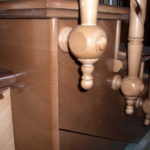 When lateral fastening of wooden poles to the stairs, the attachment point can be made as a decoration