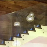 Side fastening of glass railings - on special clips