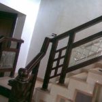 Wood, forging and glass - everything is harmonious and emphasizes the dignity of neighbors
