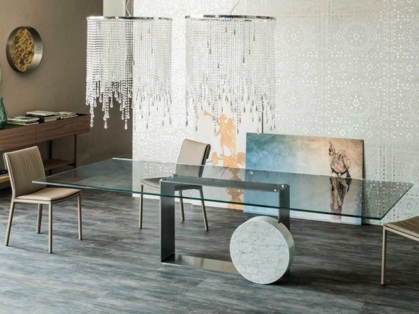 The glass table in the kitchen is almost invisible