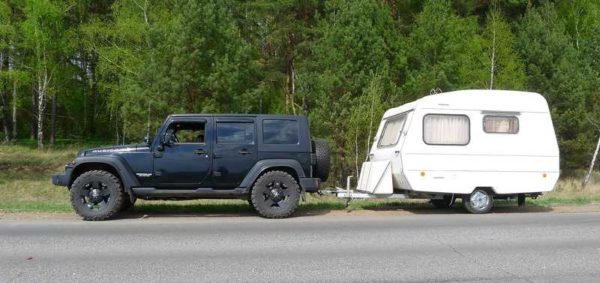 Mobile home in a trailer