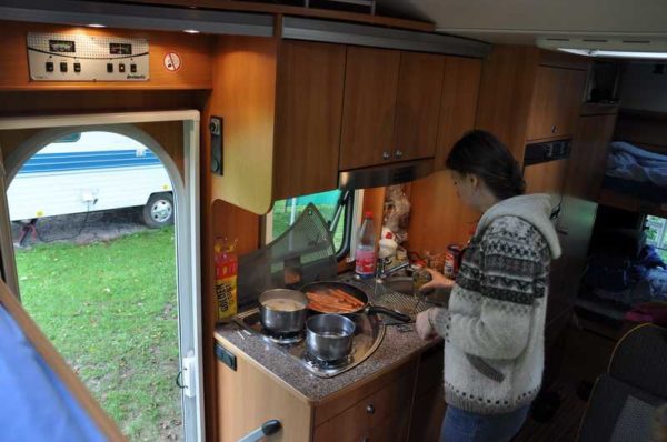 The kitchen compartment is often located next to the door
