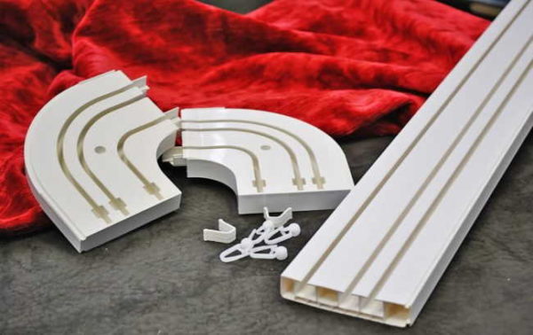 Something like this looks like a prefabricated plastic ceiling-type profile
