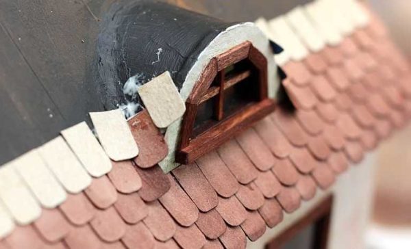 We make tiles from painted pieces of cardboard