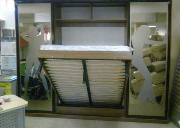 The doors are pushed back and block access to the cabinet