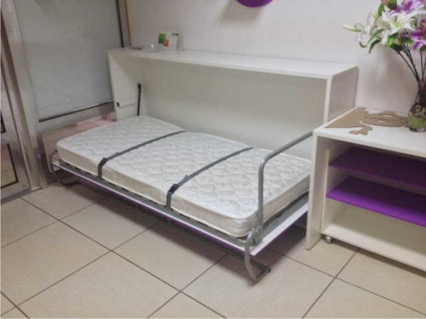 Folding bed in the form of a curbstone - horizontal lifting mechanism