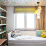 Roman blind in the interior of a children's room for a girl