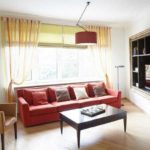 Roman blinds and tulle in a modern interior