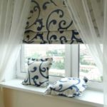 Roman blinds with tulle curtains are also a good option.