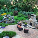 In the backyard of a private house, you can arrange a waterfall, and also - a brick grill