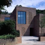 Laconic design, strict forms: photo of a brick house in a minimalist style