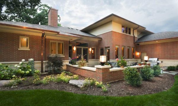 One-story brick house in the shape of the letter L - high cost per square meter, but very cozy in the yard