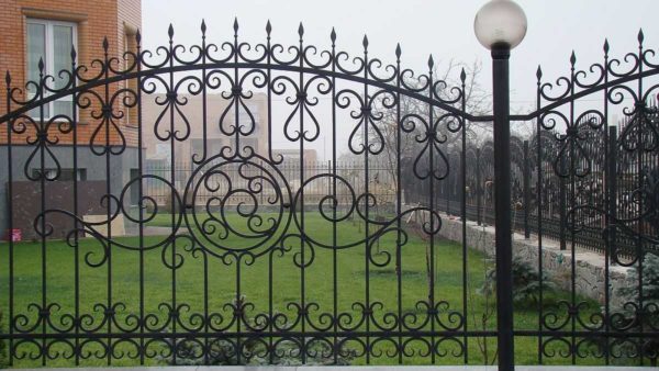 Forged-welded fences are not so expensive and look interesting