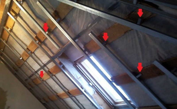 The rails are attached to the roof system with hangers