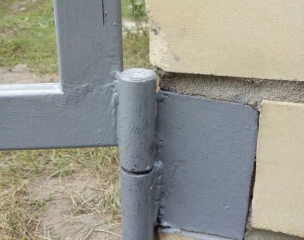 The hinge is welded to the gate