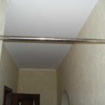 In a doorway or in a narrow hallway