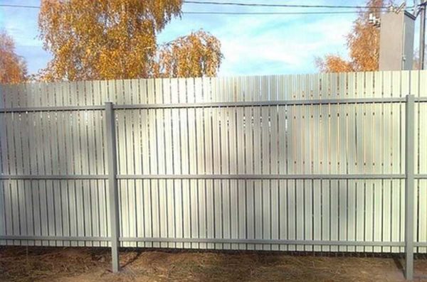 This is what the wrong side of a metal picket fence painted on one side looks like