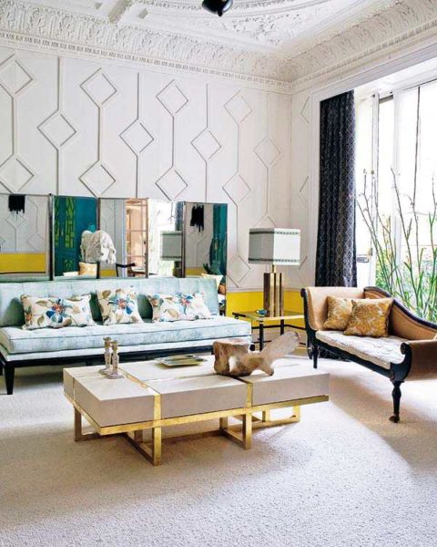 Plaster tracery on the ceiling is accentuated by geometric patterns on the walls