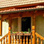 The same material covered the canopy over the porch and the roof - tiles