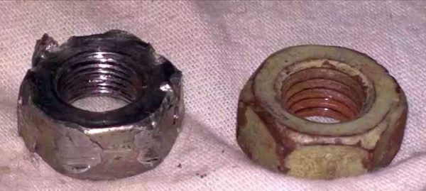 Torn off or lapped edges on a nut or bolt prevent it from being unscrewed