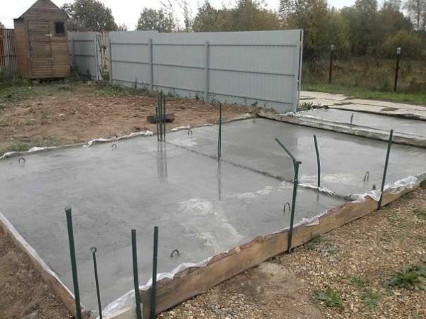 Concrete parking for a car in the country in the process of manufacturing