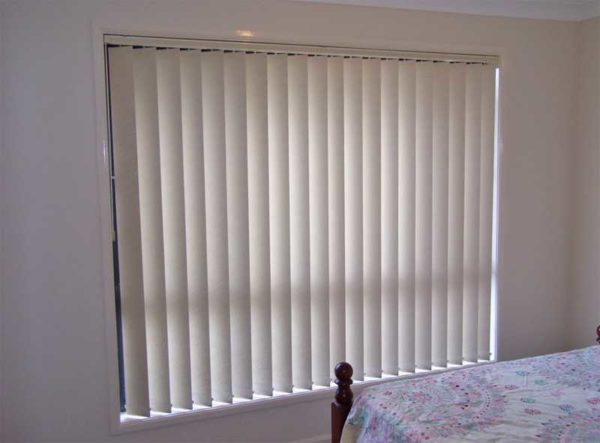 This is what vertical blinds installed in the window opening look like.