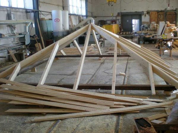 The rafter system of the 4 pitched hip roof is assembled
