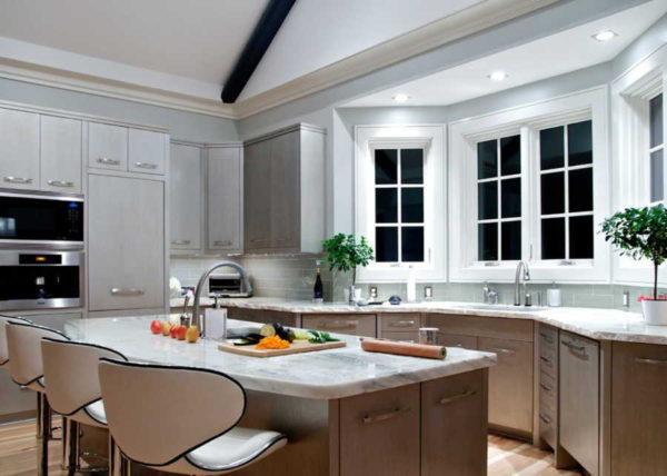 Lighting in a bay window with built-in ceiling lights is a good, and most importantly, functional idea.