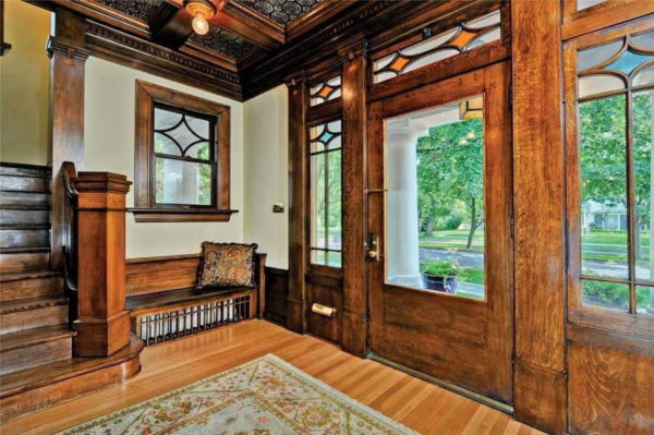 Stained glass elements in the same style on doors, windows, indoors