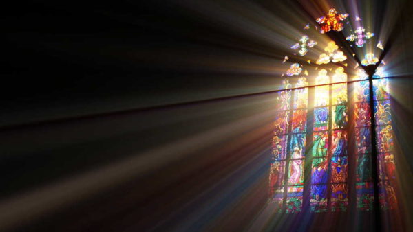 Stained-glass windows are very impressive in the semi-darkness
