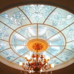 Round stained glass in the center of the ceiling