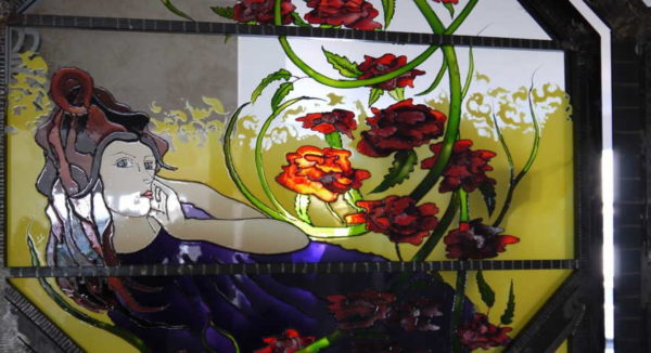 Painted stained glass - drawing is applied using paints and fixed at a high temperature