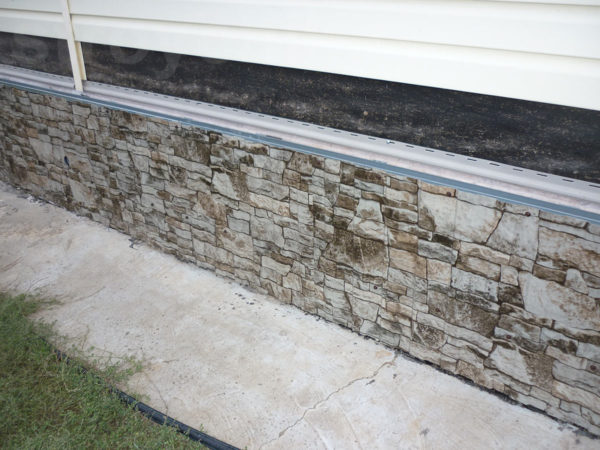The possibility of access of mice to expanded polystyrene is preliminarily blocked, then the foundation is sheathed with a profiled sheet