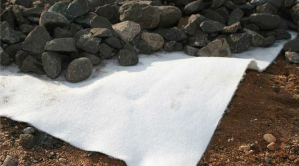 To prevent materials from mixing with the soil