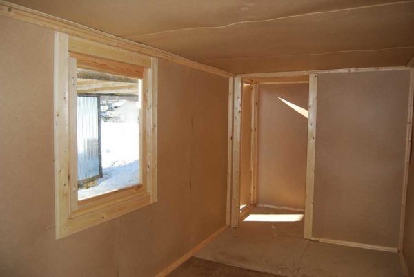 Sheathe a dacha fiberboard - a common solution