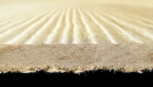 It looks like fiber cement siding on a saw cut