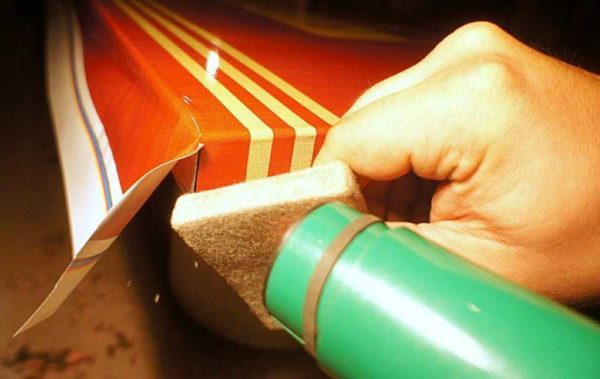 Adhesive film for furniture - glue the corner