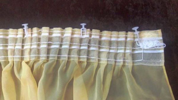 Curtain tape and hooks on it