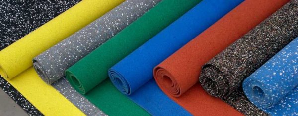 Rubber coating for playgrounds in the form of rolls