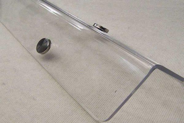 One of the transparent protective corners