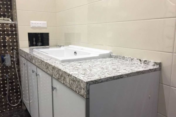 In appearance, a layman will not distinguish one type of artificial stone from another.