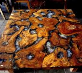 Author's furniture made of wood and epoxy resin. The second one is definitely not the same