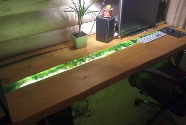 Crystal 76 was used for this wood and epoxy table. It took 10 liters (for the river and the filled crack at the wall)