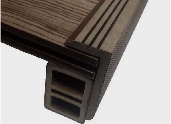 Wood-polymer board is closed from the sides by an angle