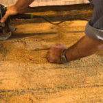 removing old paint and leveling the floor